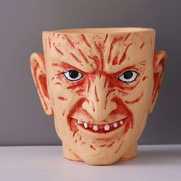 

Charming And Eerie Resin Succulent Planter Perfect For Quirky Home Enthusiasts Decor