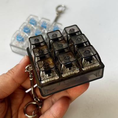 9 klávesová klávesnice Fidget klíčenka Úleva od stresu a úzkosti Přenosná cestovní Tichá Děti Dospělí Mechanická klávesnice Klikání Senzorická klávesová čepička Hračka