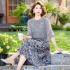 Mother's Summer Fashion: Elegant Hollow-Out Top & Printed Skirt Set for a Youthful Style