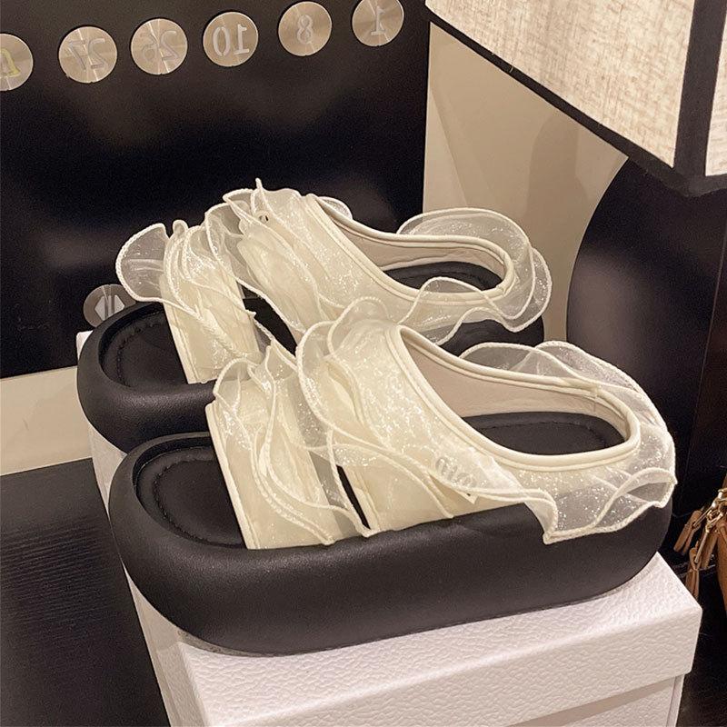 European Station high-luxury slippers women's 2025 summer new beach heightening outer wear versatile stepping on shit thick-bottomed cool slippers