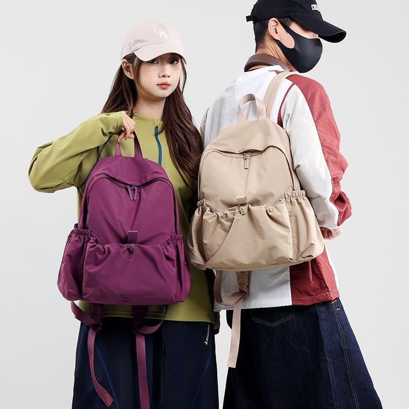 Schoolbag new Korean version casual large-capacity student backpack men's and women's 1011 light outdoor sports mountaineering bag