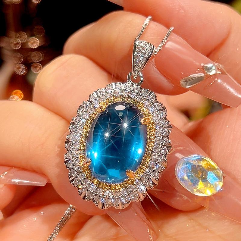 

Ювелирные изделия Имитация Синей Шпинели Ретро Легкая Роскошь Набор Подвеска с Главным Камнем 13 * 18