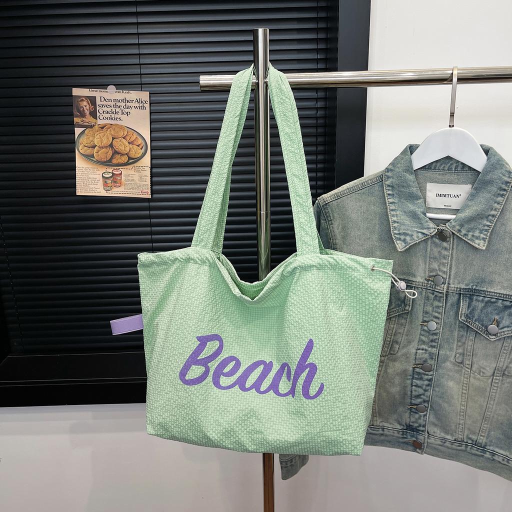 Korean version of the new letter printing casual large-capacity tote bag, light travel versatile lazy wind shoulder stray bag