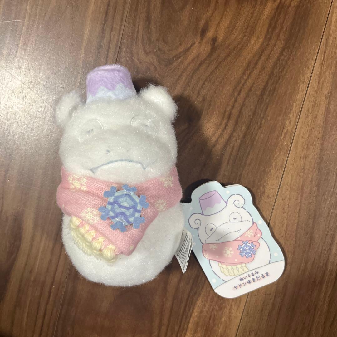 Pokemon Slowpoke snowman plush toy.