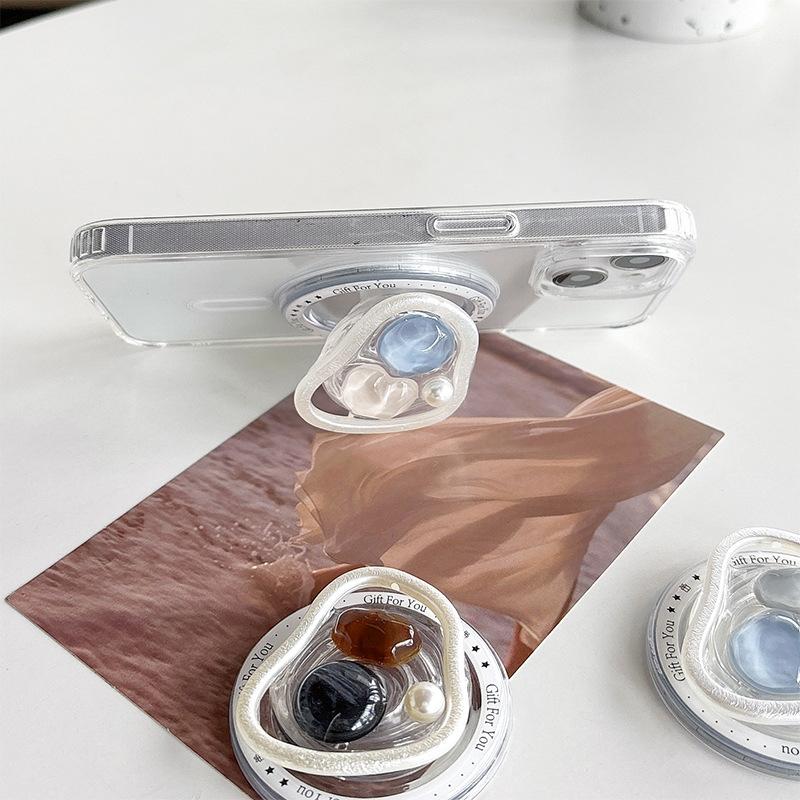 Xiaoqing Fresh Air Mobile Phone Airbag Holder Magnetic Suction Retractable Jewel Pearl Light Luxury Desktop Lazy Watching Drama