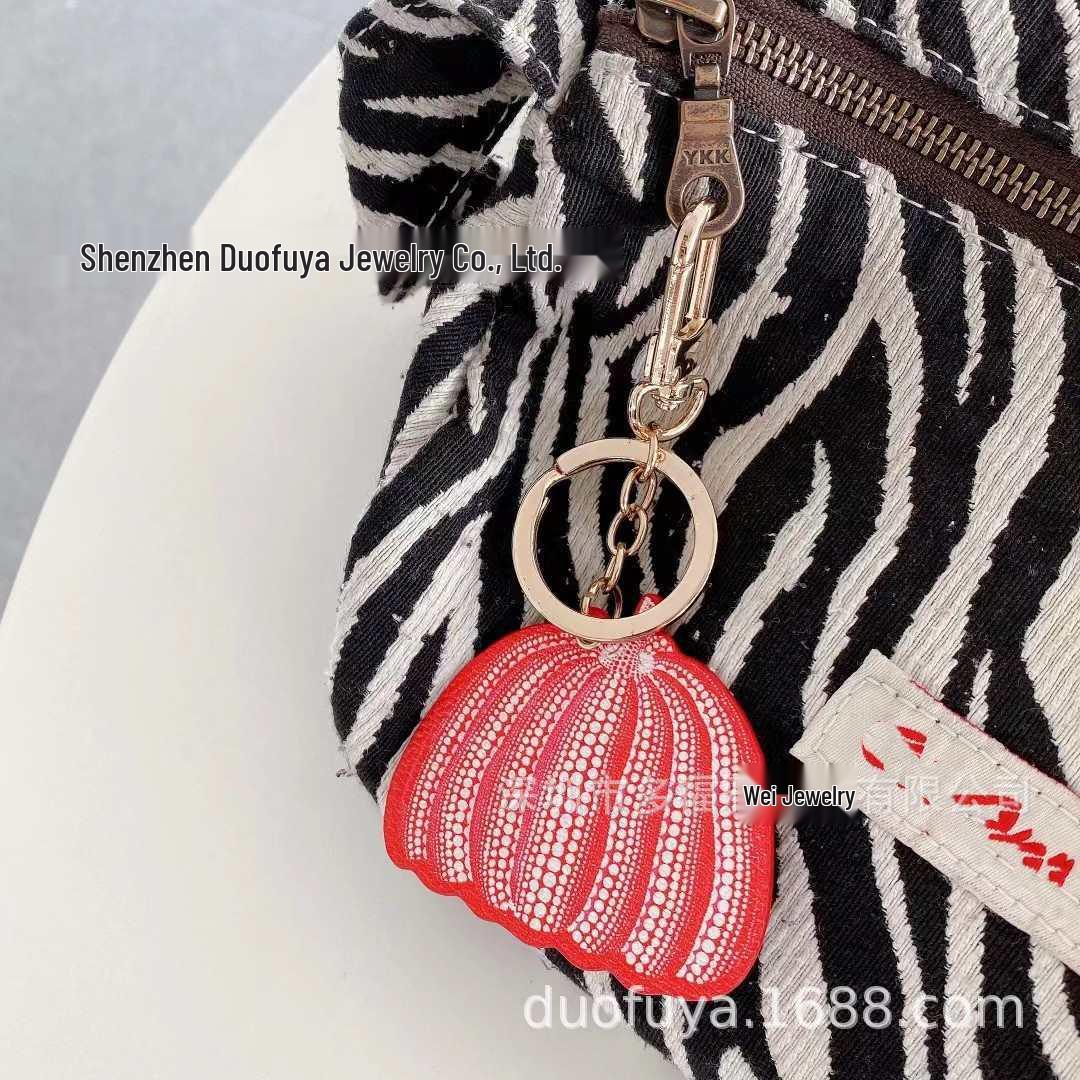 

Korean Creative Pumpkin Bag Pendant: Cute Women s Ornament & Celebrity Car Keychain in Monogram Light Luxury Design No Box