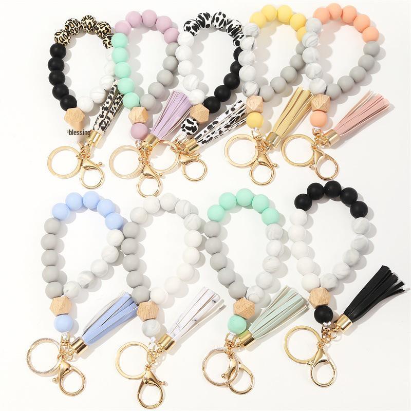 Silicone and Wooden Bead Keychain Bracelet with PU Tassel