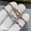 Fred High-End Náramek s podkovovou sponou a červenou šňůrkou s diamanty z 18karátového růžového zlata pro páry