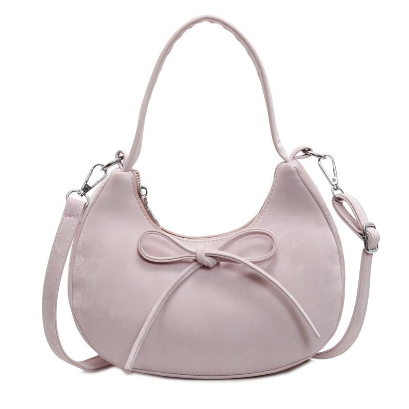 This year, simple bows, sweet wind, portable crescent bags, niche leisure, high-end sense, versatile messenger women's bags are popular.