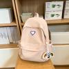 School bags, female college students, simple solid colors, love, junior high student, niche and versatile girls, high school student backpacks, trends