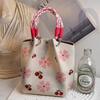 Versatile Large Knitted Handbag with Hollow-Out Flower Pattern