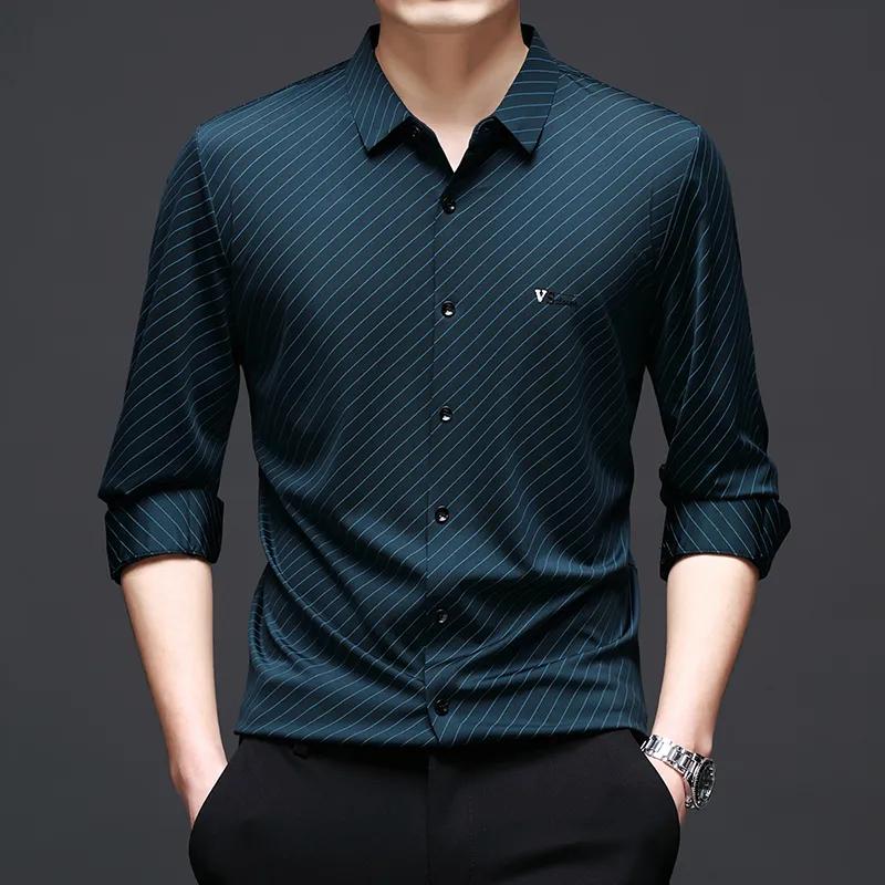 

Мужская осенняя темно-зеленая рубашка с диагональной полоской, с длинным рукавом M циан