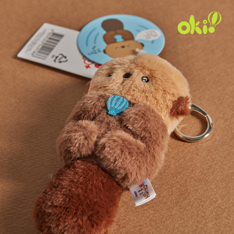 Cute sea otter doll keychain bag charm bag