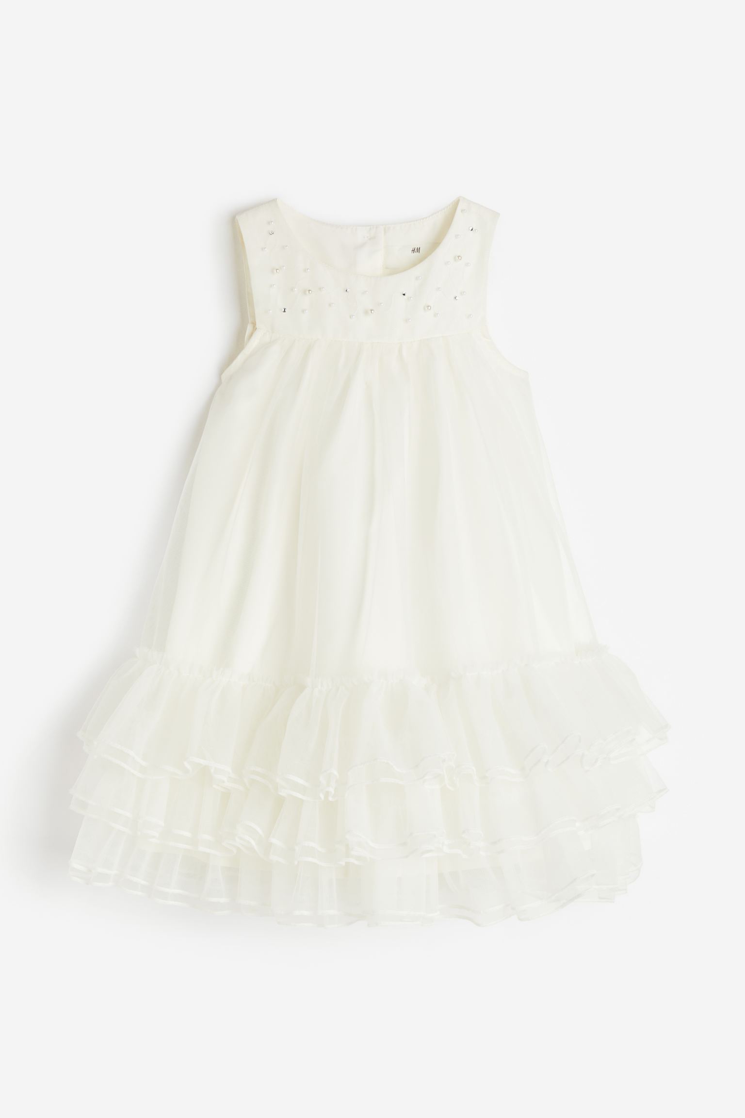 

Платье из тюля, украшенное бусинами