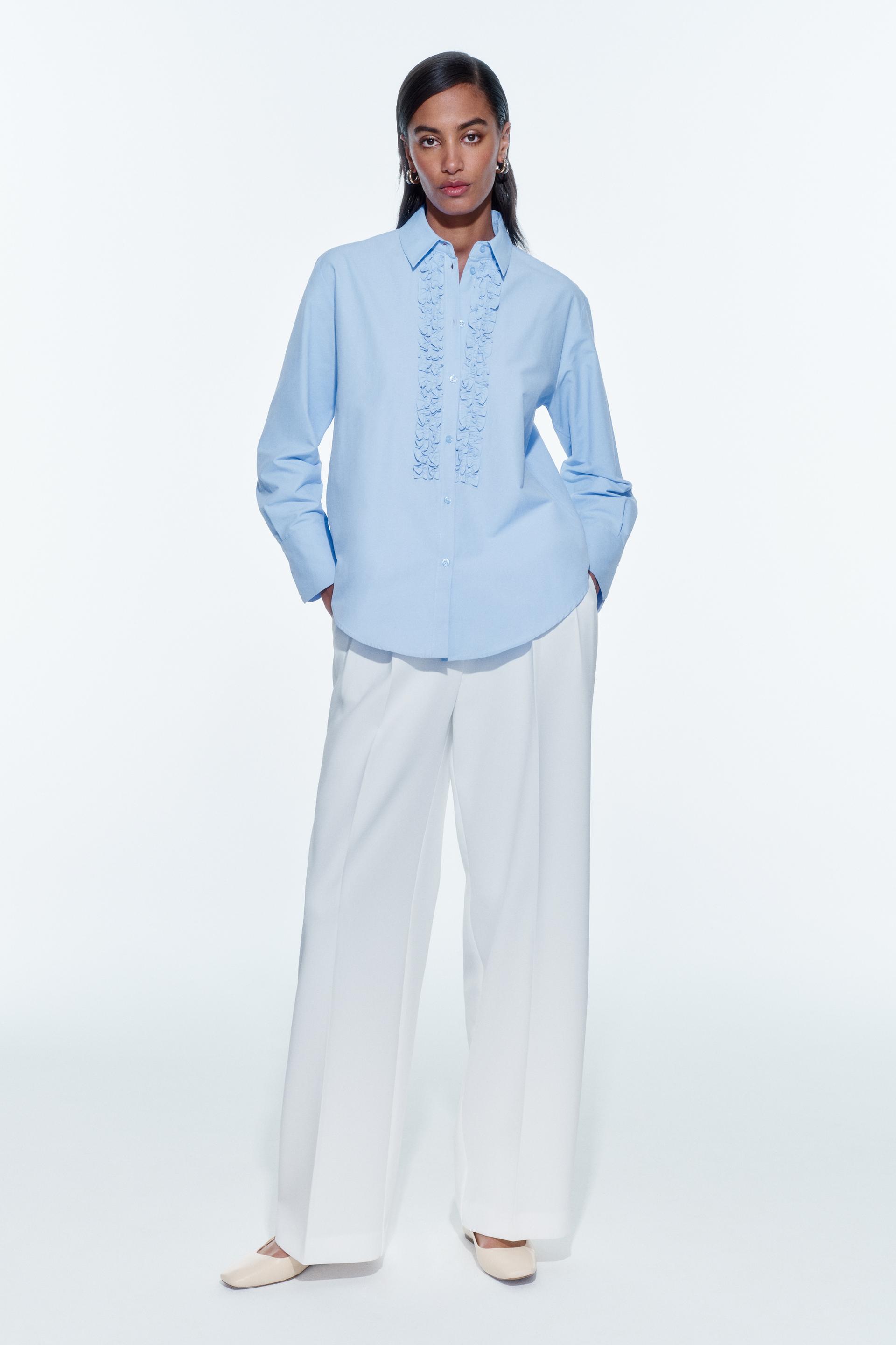 

БЛУЗКА С ОБОРКАМИ С БУСИНАМИ ИСКУССТВЕННЫЙ ЖЕМЧУГ