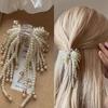 2024 Pearl Tassel Shark Clip: Elegant Women's Half-Updo Accessory