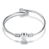 Stylish Women's Bracelet: Stainless Steel Peach Heart with Braided Cable and European-American 26 Letters Design