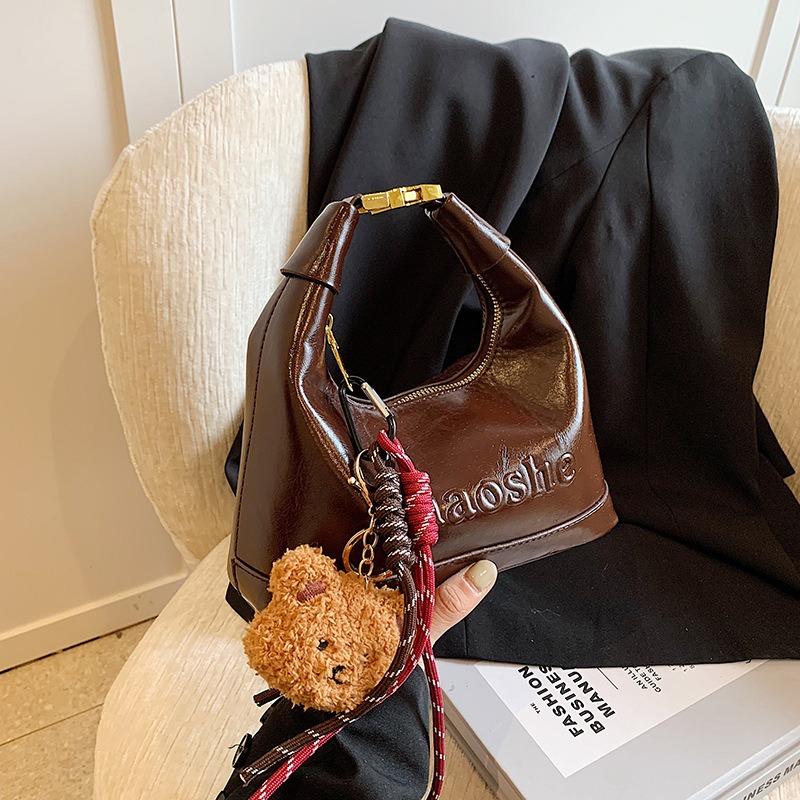 Bag New Autumn and Winter Leather Women's Bag High Sense Maillard Popular Fashion Hand Carry Crossbody Bag Luggage