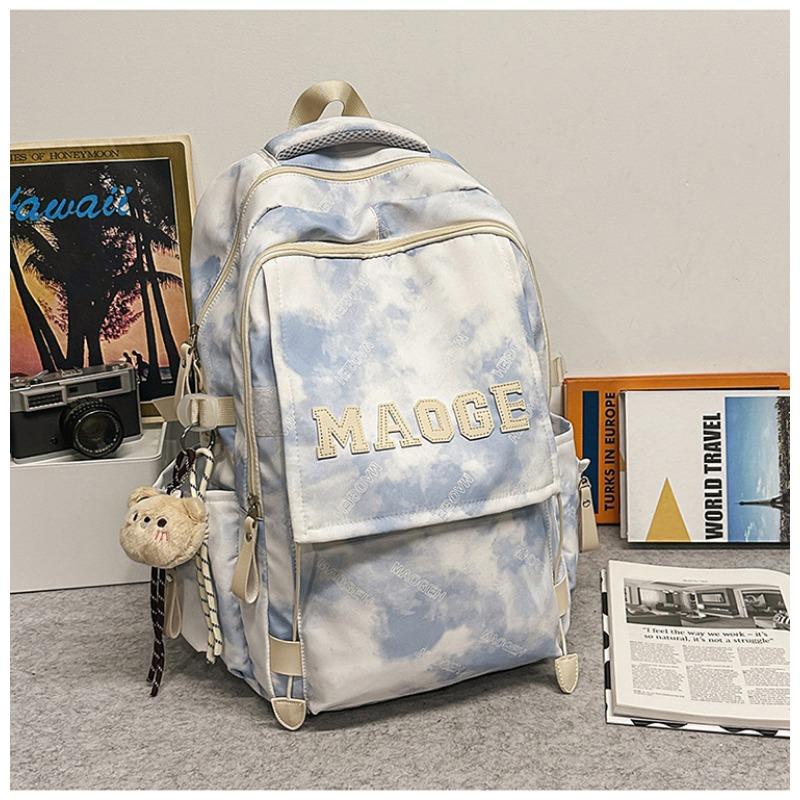 Der neue Schulranzen ist hochwertig, frisch und süß, ein Rucksack mit literarischem Graffiti-Tie-Dye und ein leichter Rucksack für Junior- und Oberstufenschüler.