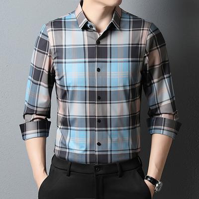 Camisa a cuadros de moda para hombres jóvenes y de mediana edad. Nuevo cárdigan atractivo de primavera. Camisa de fondo informal de estilo coreano de moda.
