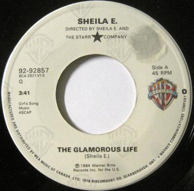 7inch Record SHEILA E. - The Glamorous Life 9292857 Warner Bros. Re 1984 Canada Soul/Funk Used