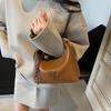 High-end niche bag women's spring retro new fashion messenger bag women's portable work dumpling bag