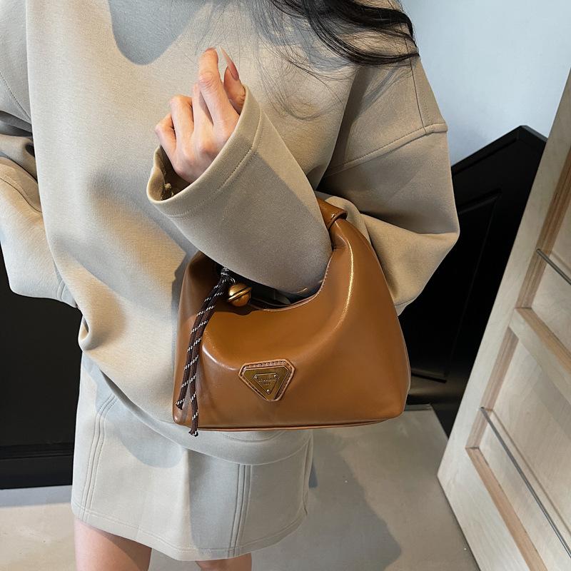 High-end niche bag women's spring retro new fashion messenger bag women's portable work dumpling bag
