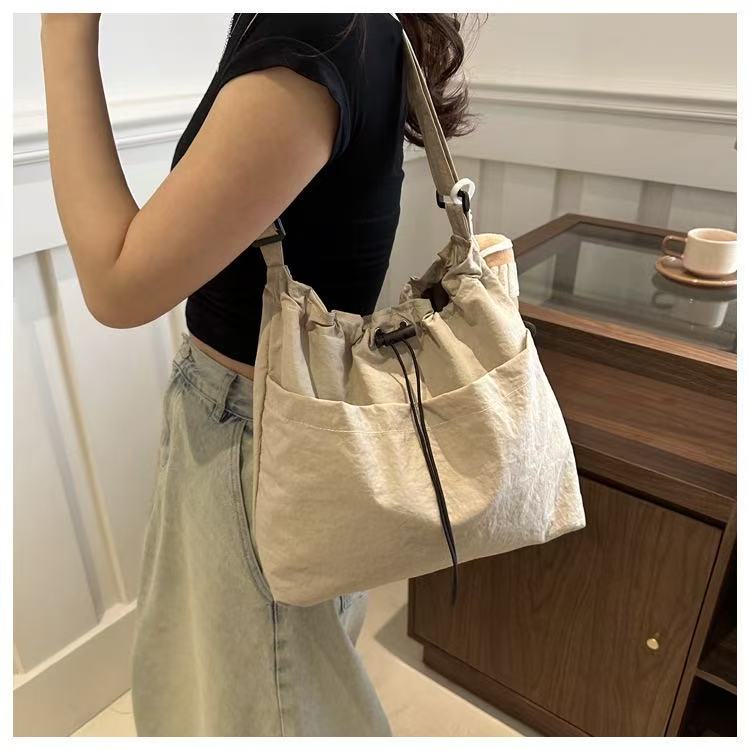 Large Capacity Women Drawstring Tote Bag Japanese Ins Style Casual Crossbody Shoulder Bag for Daily Commute Shopping