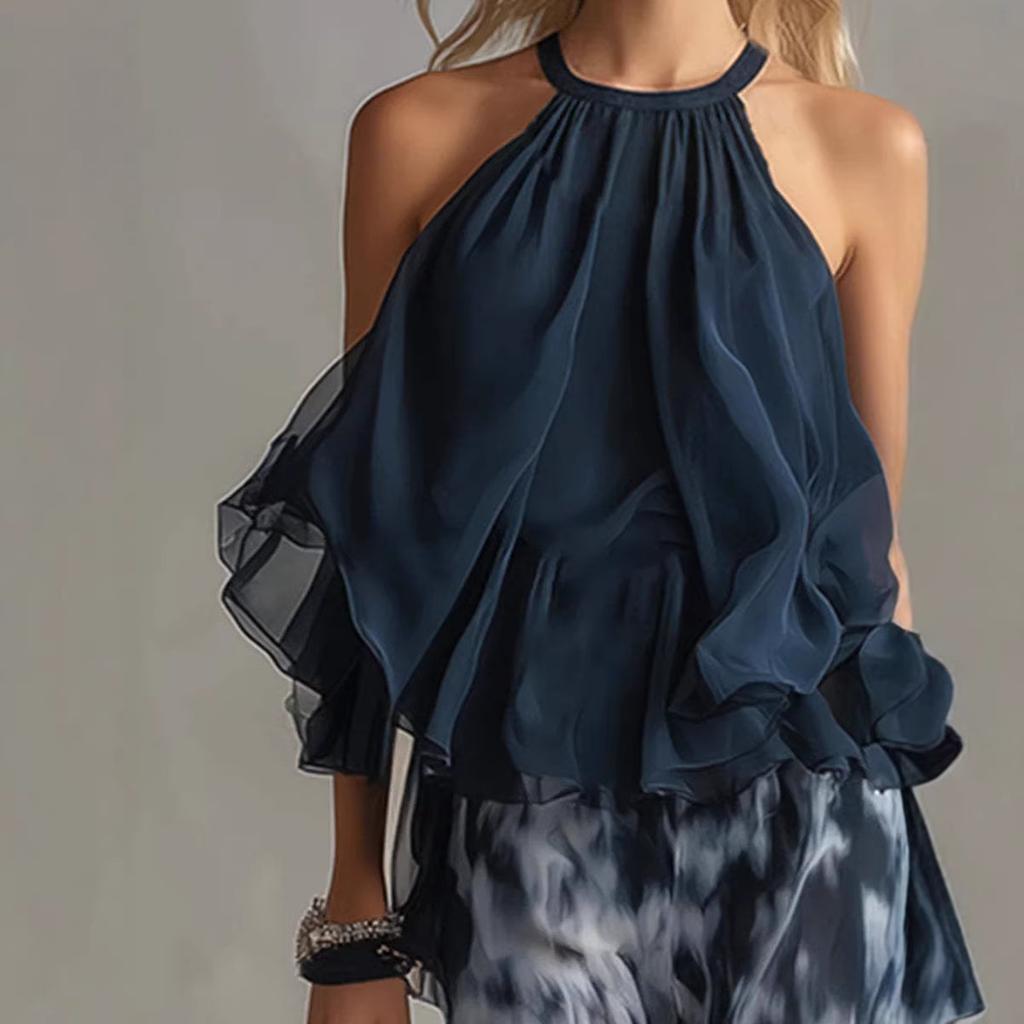 Completo due pezzi con top senza maniche con scollo all'americana, dettaglio a balze e pantaloni a gamba larga sfumati