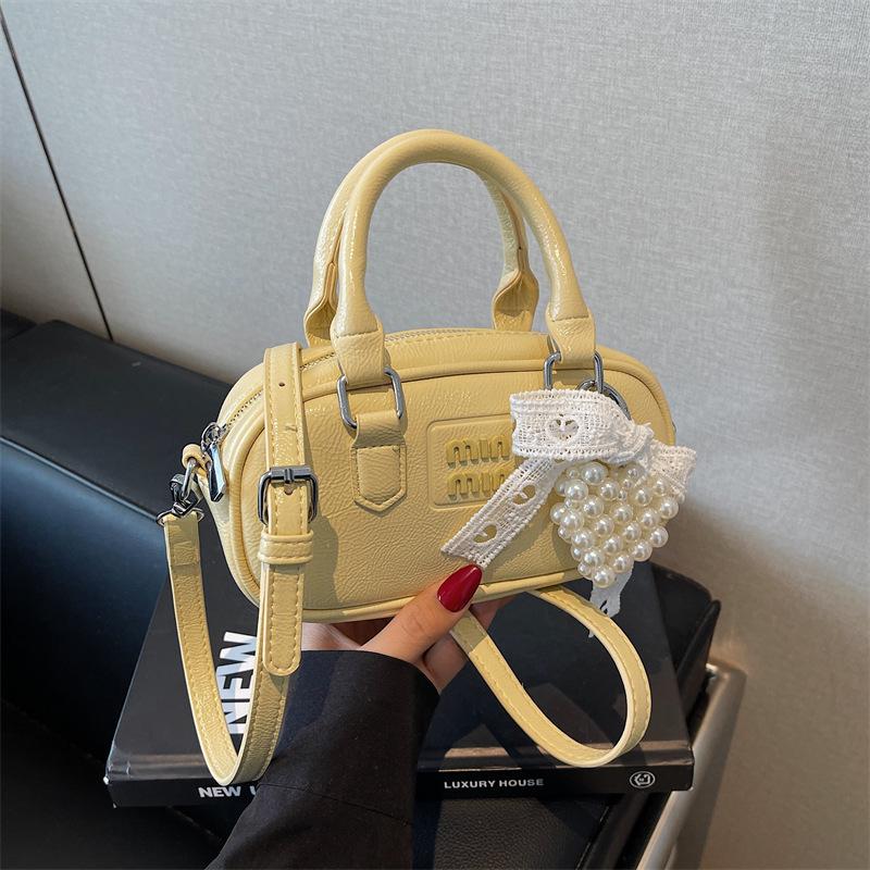 Niche casual messenger bag new fashion shoulder bag feeling hand carry bowling women's bag handbag bag