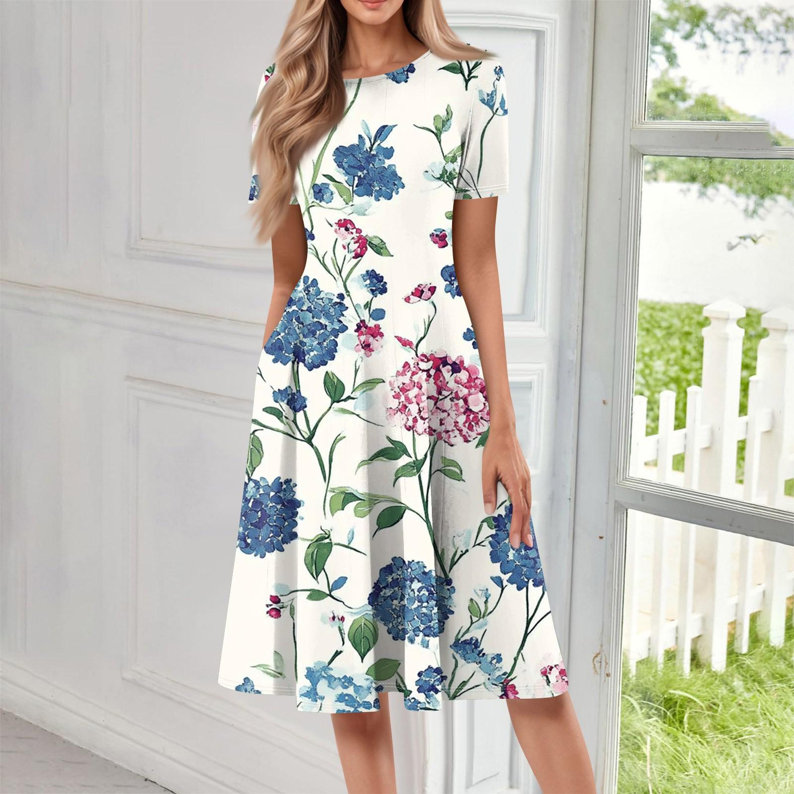 

Жіноча вільна повсякденна та модна сукня середньої довжини з круглим вирізом і короткими рукавами з принтом L