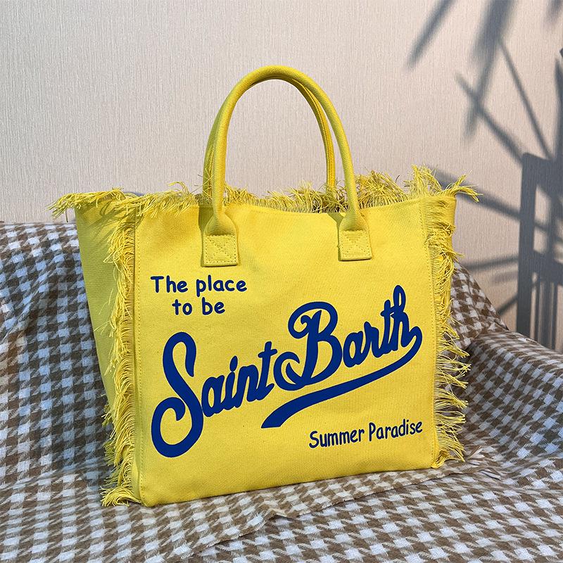 Large Capacity Canvas Tote Bag with Denim Fabric and Tassel Design for Commuting