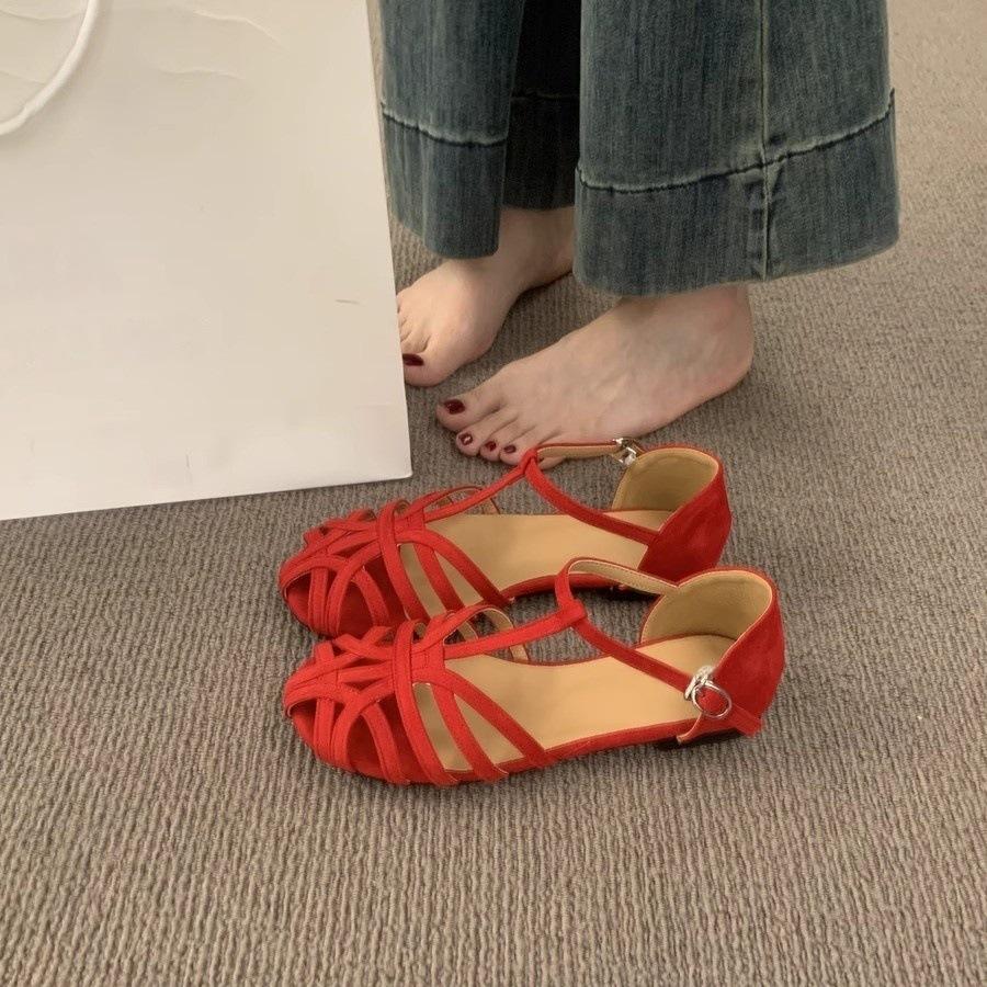 Retro woven hollow bag head sandals women's summer 2025 new one-word buckle bag heel flat Roman shoes