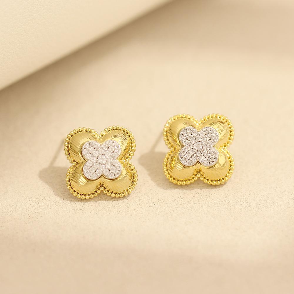 Europese en Amerikaanse niche tweekleurige goud gegalvaniseerde oorbellen exquise micro-ingelegde zirkoon bladoorbellen 925 zilveren naald oorbellen damesaccess