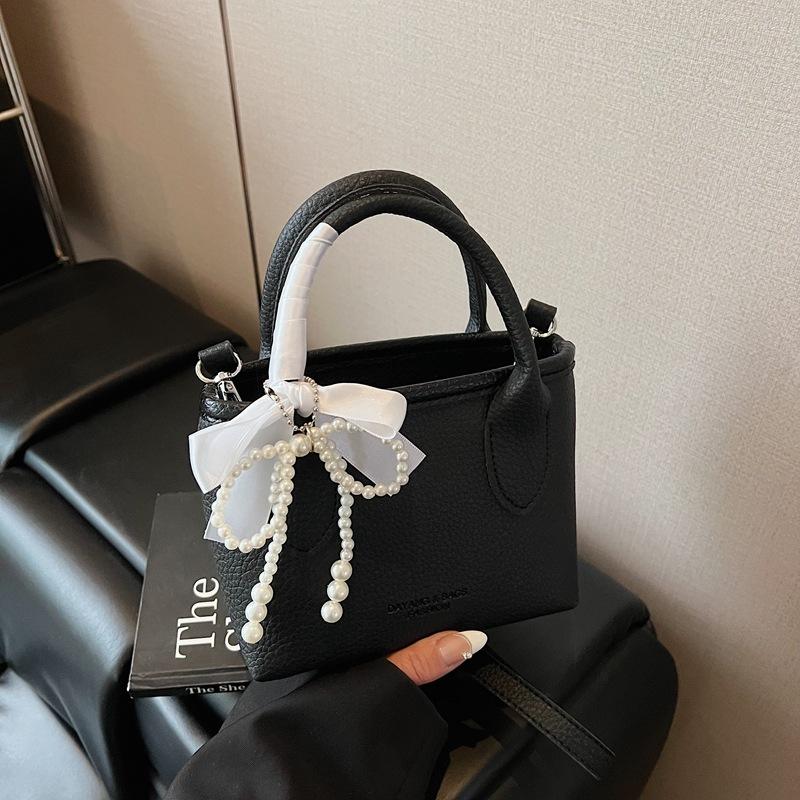 Niche design portable bucket bag women's 2025 new spring and summer bag shoulder messenger bag tide