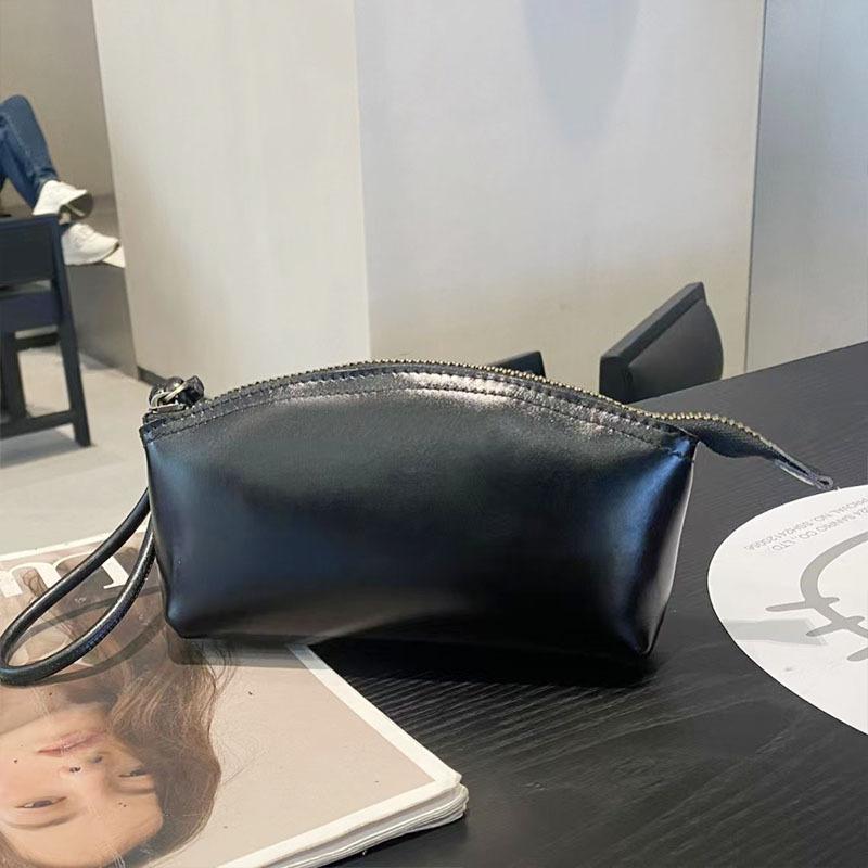 Handheld wallet New leather casual dinner bag First layer cowhide cosmetic bag Fashion versatile women's bag