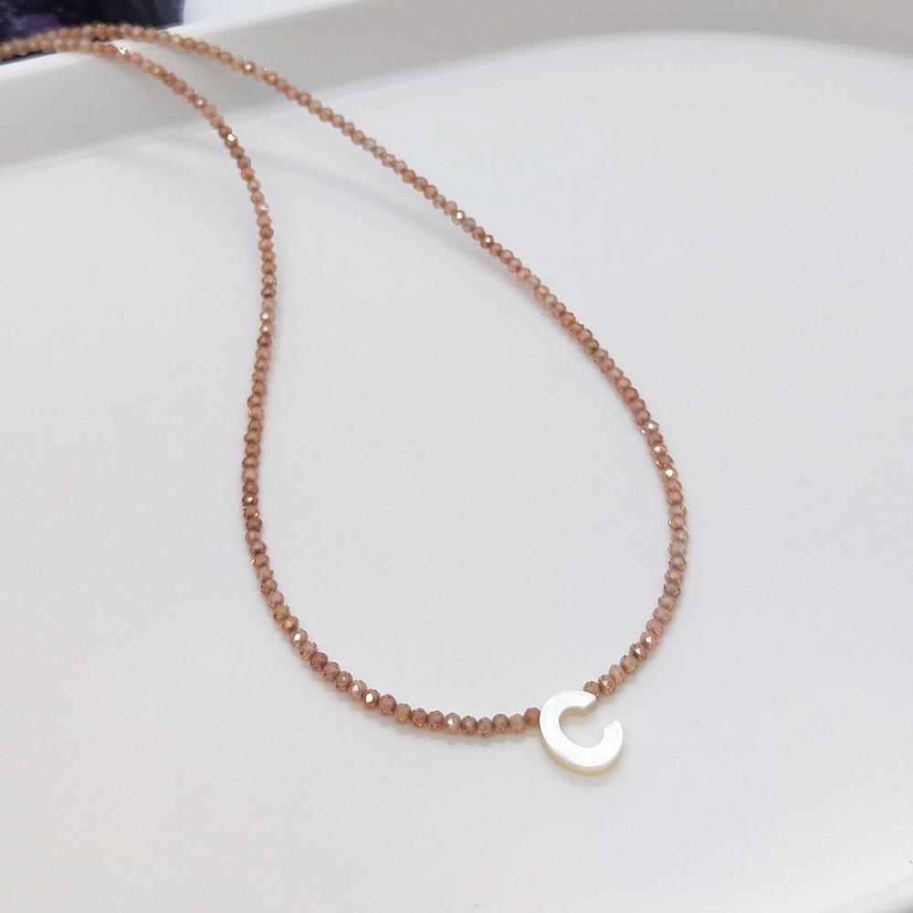 Elegant 2m Zircon Beaded Clavicle Chain: 26-Letter Deep Sea Shell Necklace for Women.