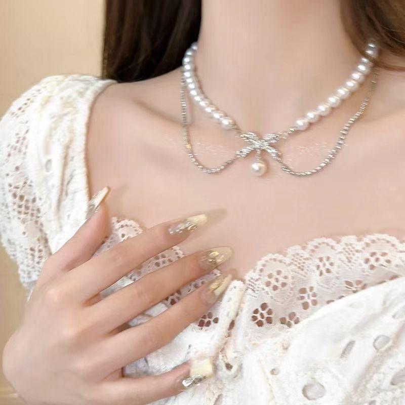 2024 Vintage Double-Layer Pearl Necklace with Heart Pendant