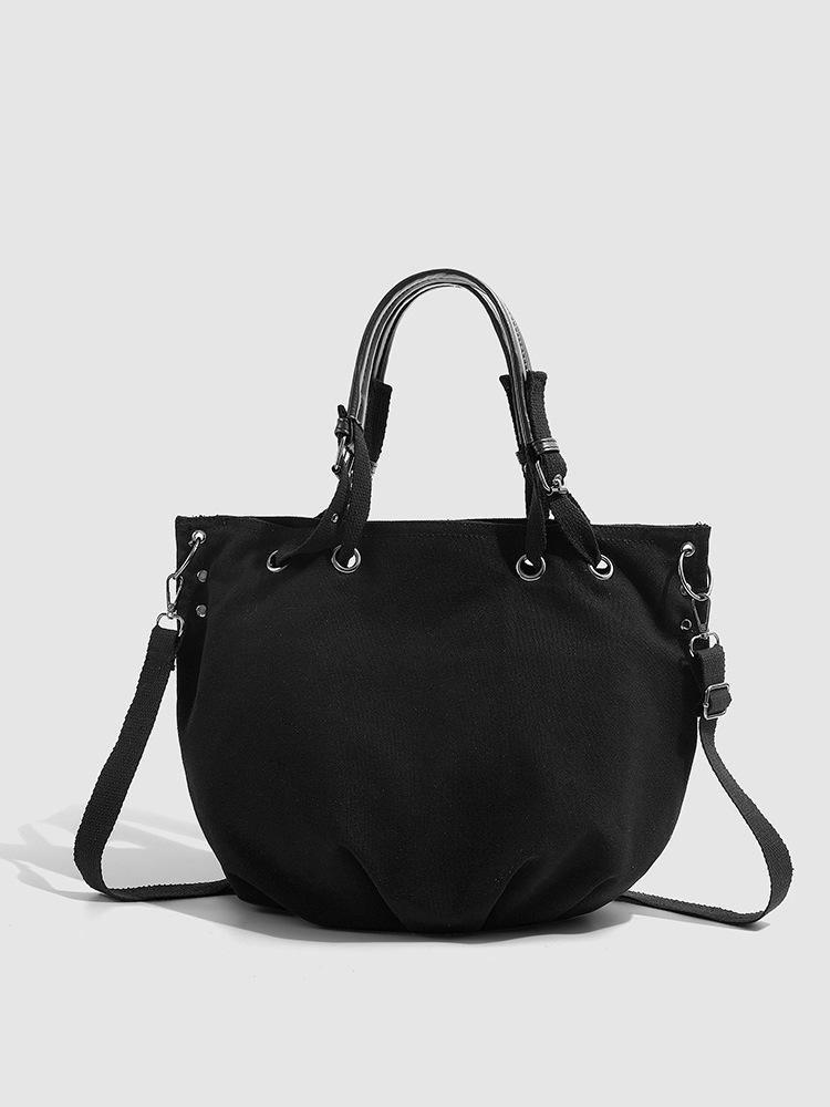 

2025 new casual tote bag large capacity canvas bag retro commuter handbag women s shoulder oblique span bag tide чёрный