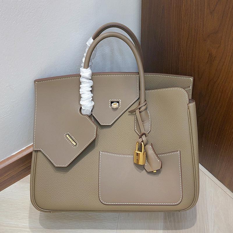 2025 Neuer Stil Reißverschluss Ledertasche 30cm Doppelseitig Unregelmäßig Echtes Leder Damenhandtasche High-End Handgefühl Henkeltasche