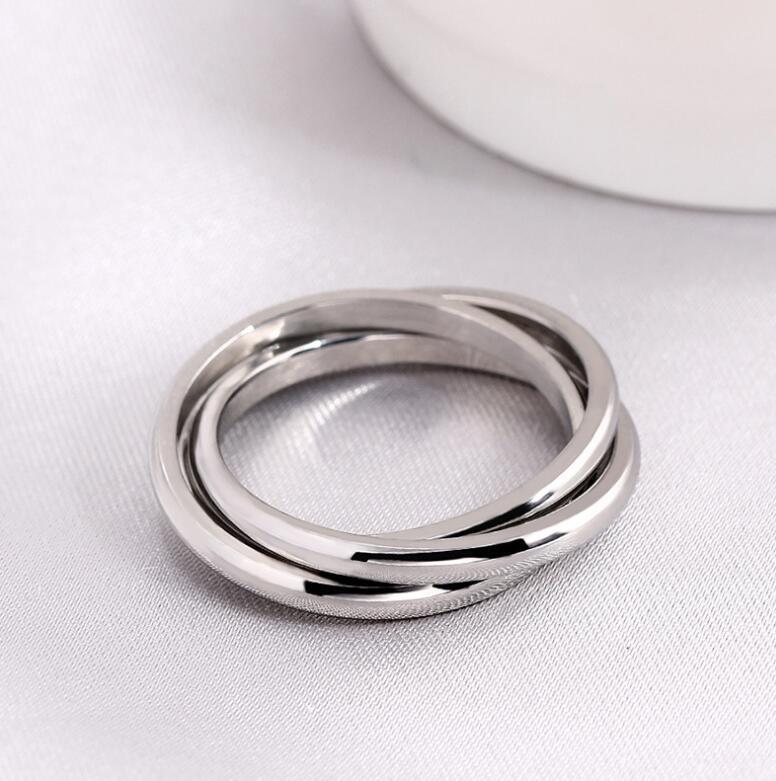 Three Worlds Titanium Steel Couple Ring for Women: Luxurious Modern Style with European and American Influence