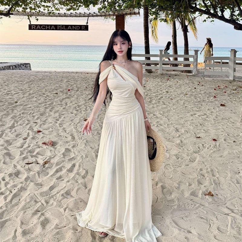 French white off-the-shoulder hollow pleated dress, high-end female summer pure desire wind vacation beach fairy long dress