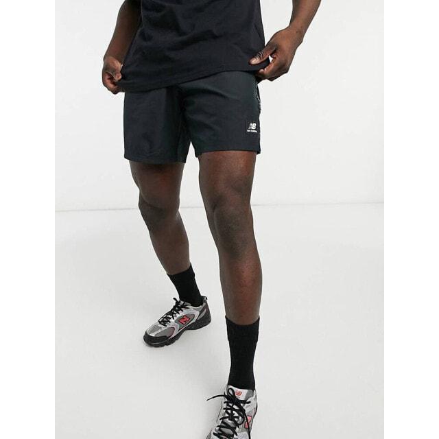 

Черные сетчатые шорты New Balance