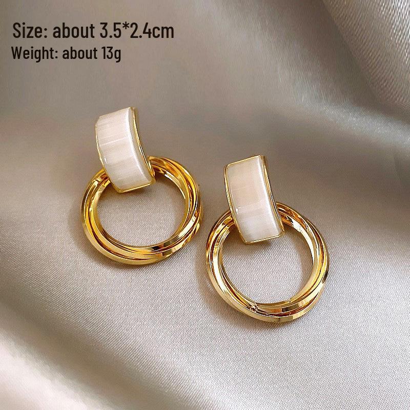 

Модные серьги «кошачий глаз»: Высококлассный, Милый и Персонализированный Дизайн Белой Иглы.