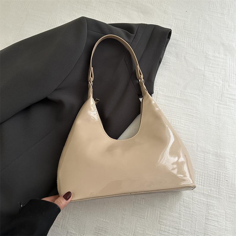 Temperament lässig glänzend 2025 ausländischer Stil Frühling und Sommer neu Lackleder Mode leichte Luxus Schultertasche tragbar Unterarm Damen Tasche