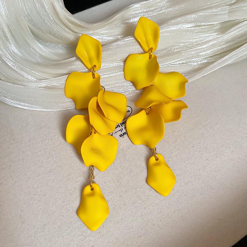 Boucles d'oreilles bohèmes roses à fleurs de perles de rocaille et pompons de perles