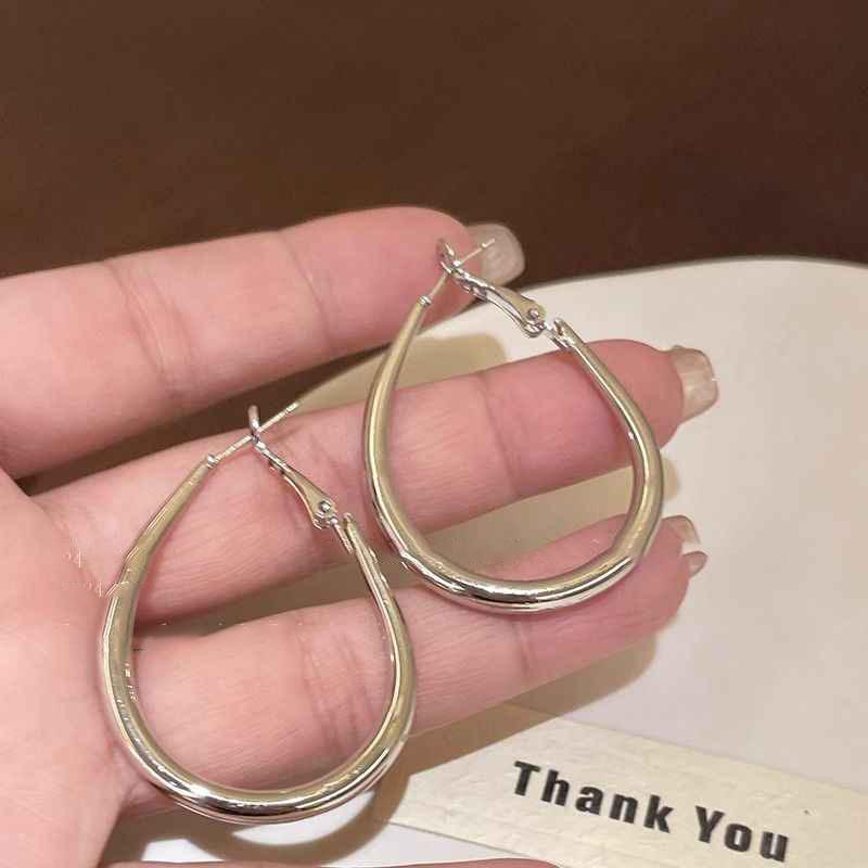 Silver needle simple oval U-shaped earrings, cold wind exaggerated earrings, simple niche ins temperament earrings women
