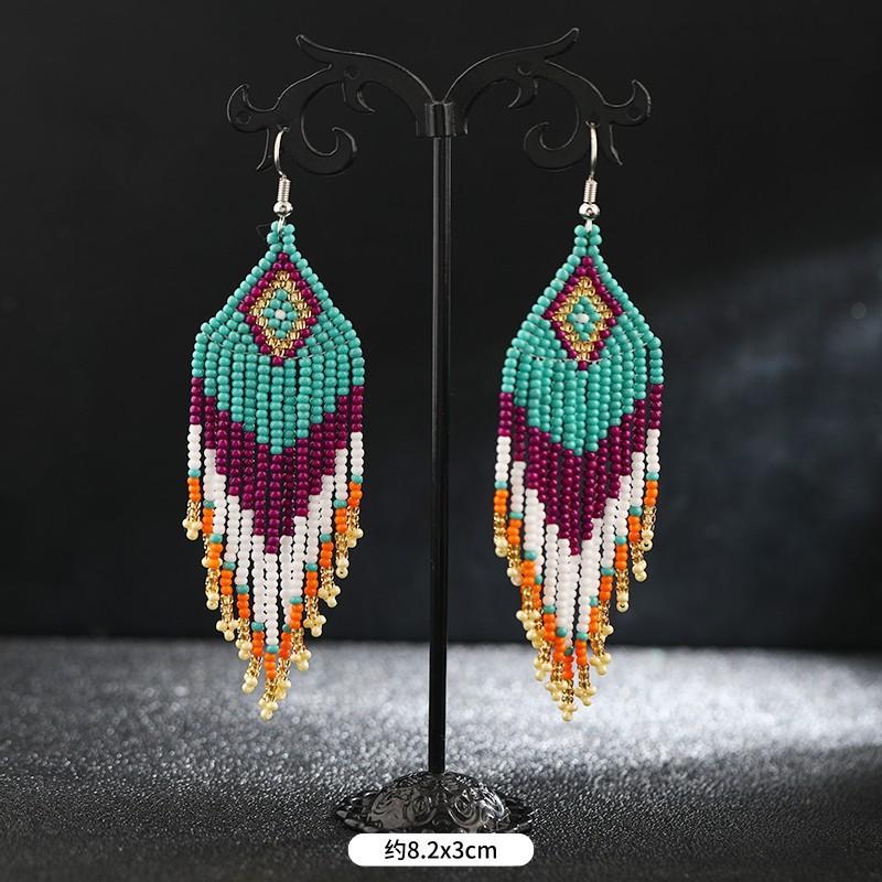 Brincos longos de borla feitos à mão com contas de arroz, nicho retrô boêmio, brincos de férias personalizados e estilosos