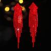 Nicht verblassende rote Ohrringe mit langen Fransen