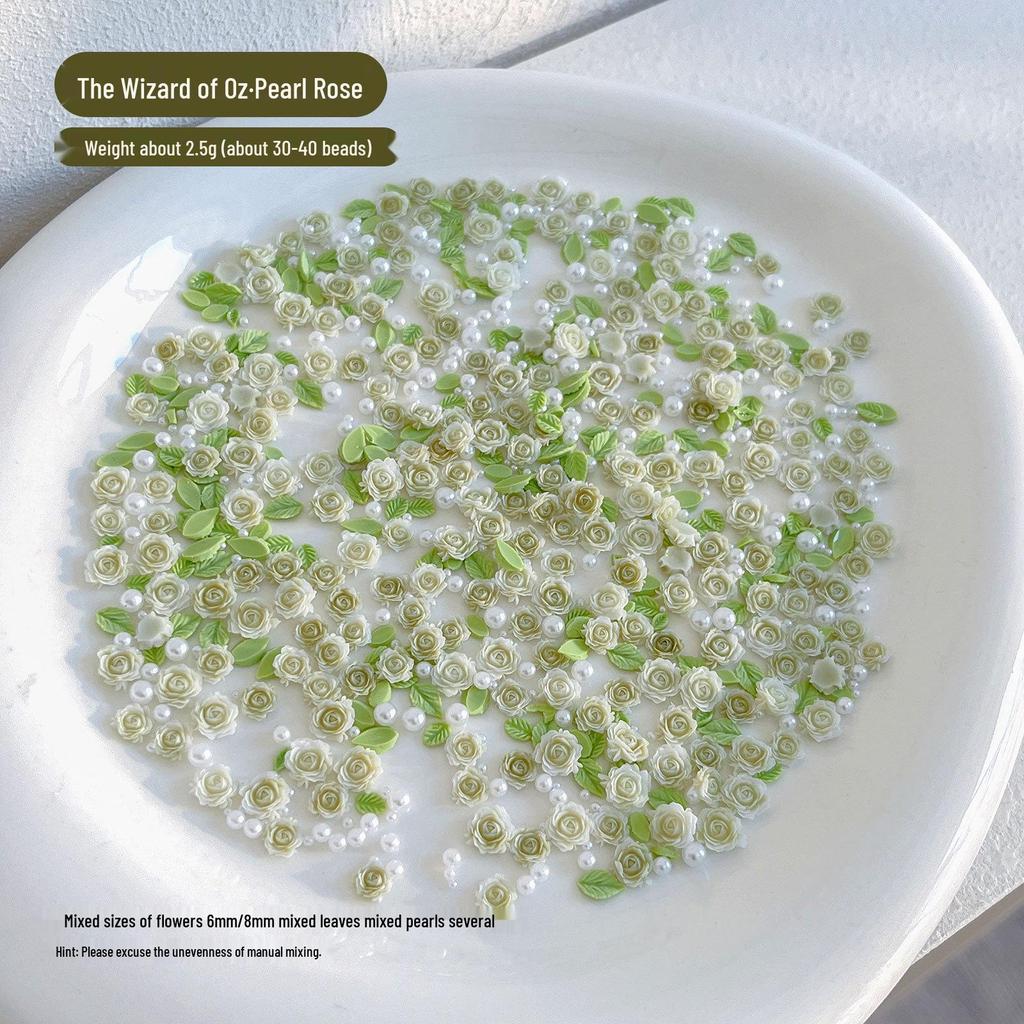 ვარდისფერი 3D ვარდის ნეილ-არტი ფისოვანი ყვავილებით და შერეული მარგალიტებით